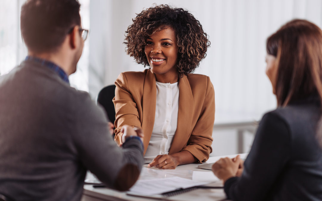 Business people shaking hands after meeting