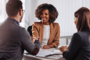 Business people shaking hands after meeting